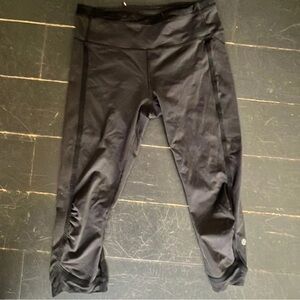 Lululemon Capri leggings with rose gold zipper and threading